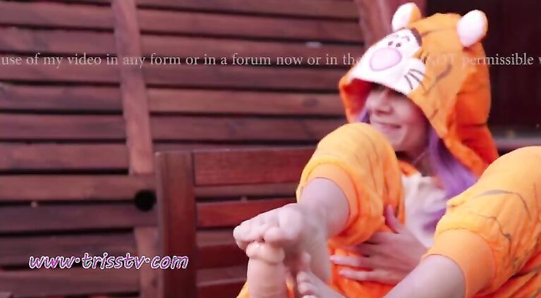 FOOTJOB OUTDOOR WITH A TIGER COSTUME