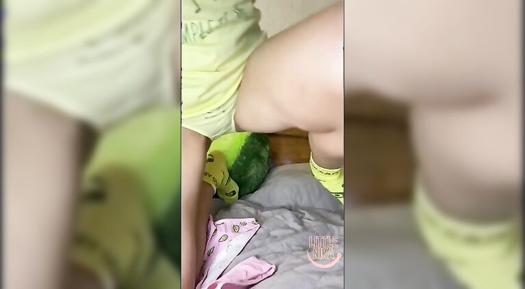 The bitch masturbates on Skype, stuffs her ass with panties