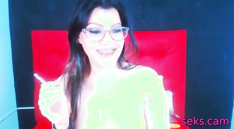 Shy amateur with glasses on webcam