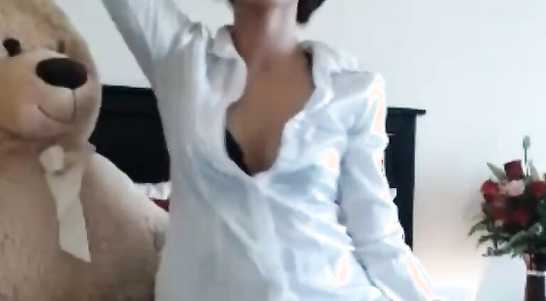 cute asian girl blows bear